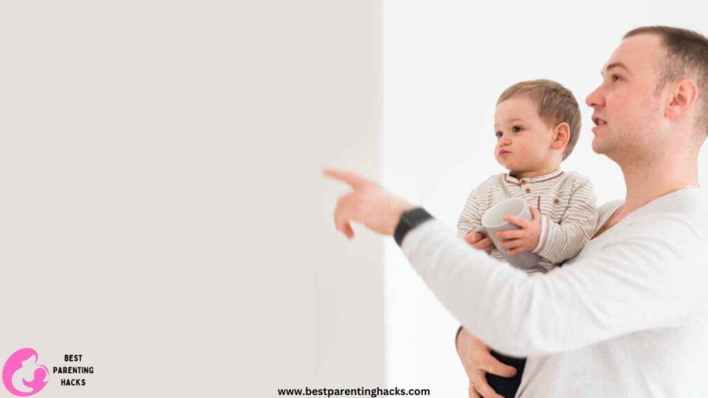 baby grabbing the back of his head